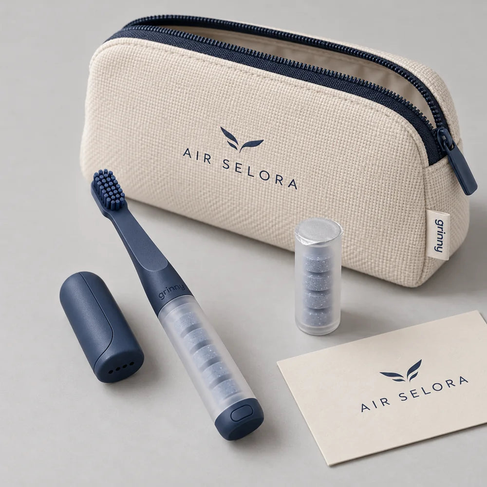 Air Selora concept: a navy miniature brush with airline branding and amenity kit