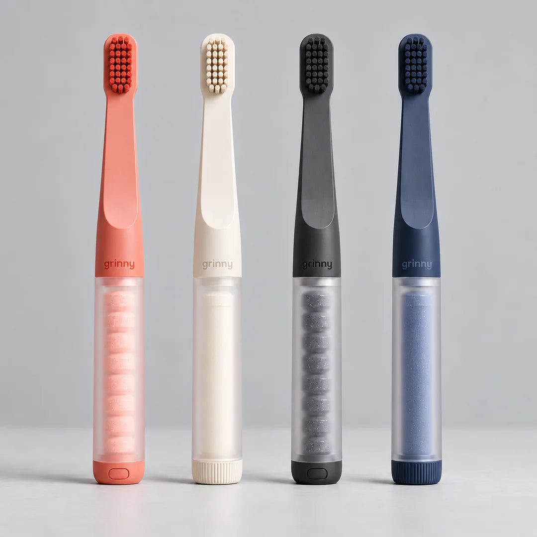 grinny home brushes in coral, soft white, charcoal and navy